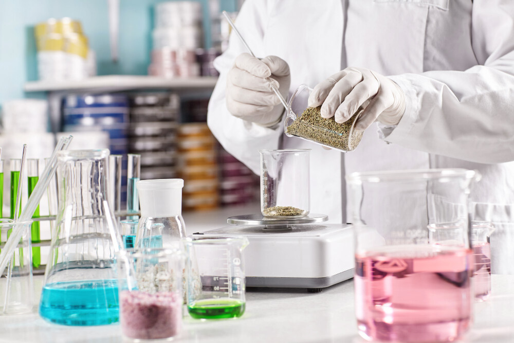 Laboratory technician conducting sugar testing for beverages and food products in Qatar