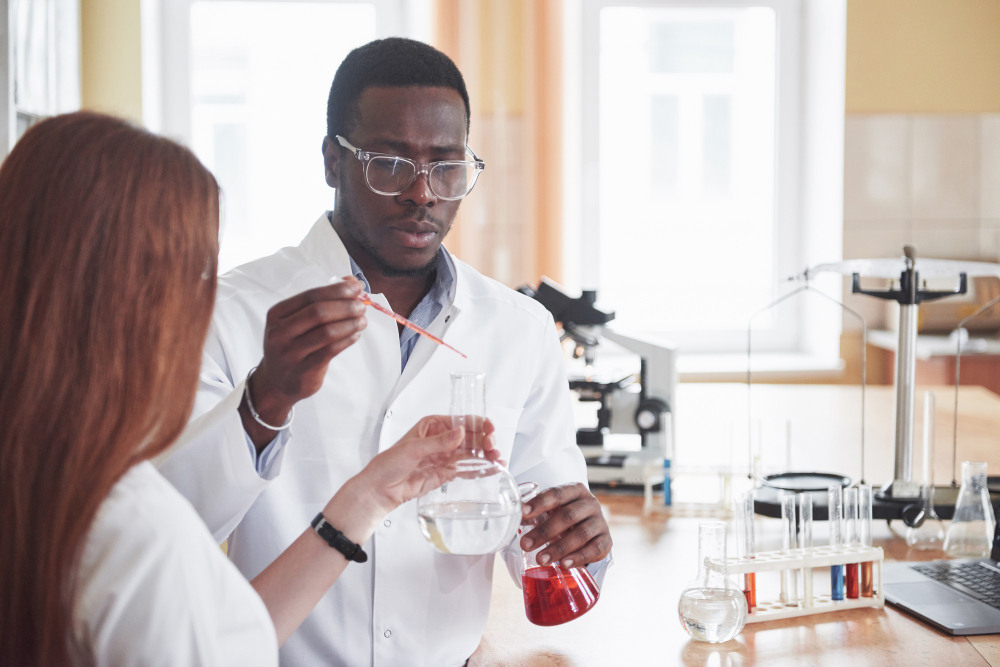 Microbiology laboratory technician analyzing samples for contamination detection and quality control.